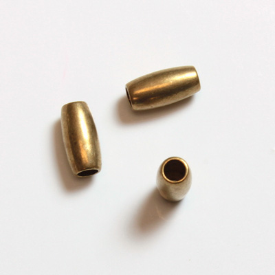 Brass Machine Made Bead - Smooth Oval 07.5x3MM.5MM RAW BRASS