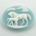 Plastic Cameo - Horses Oval 40x30MM WHITE ON BLUE