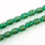 Czech Pressed Glass Engraved Bead - Oval 09x7MM GOLD ON EMERALD