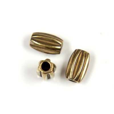 Brass Machine Made Bead - Ribbed Oval 05.7x03.6MM RAW BRASS