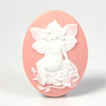 Plastic Cameo - Fairy Sitting on Garden Stone Oval 40x30MM WHITE ON PINK