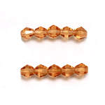 Czech Glass Fire Polished Bead - Bicone 06MM GOLDFISH